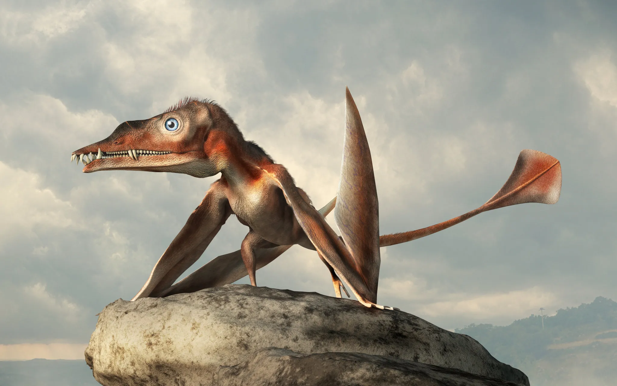Un reptile volant, avec des ailes, une longue queue et des dents